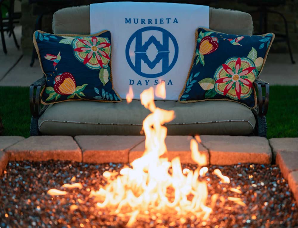 A lit firepit at dusk